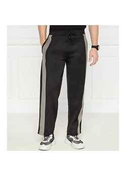 HUGO Spodnie dresowe HUGO X RACING BULLS | Oversize fit ze sklepu Gomez Fashion Store w kategorii Spodnie męskie - zdjęcie 184511439