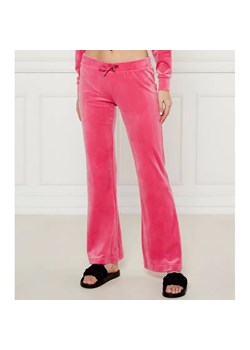 Juicy Couture Spodnie dresowe CHRISTINE | flare fit | low rise ze sklepu Gomez Fashion Store w kategorii Spodnie damskie - zdjęcie 184512658