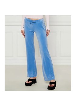 Juicy Couture Spodnie dresowe CHRISTINE | flare fit | low rise ze sklepu Gomez Fashion Store w kategorii Spodnie damskie - zdjęcie 184512837