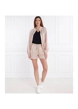 Liu Jo Sport Spodnie dresowe 2w1 | Relaxed fit ze sklepu Gomez Fashion Store w kategorii Spodnie damskie - zdjęcie 184513116
