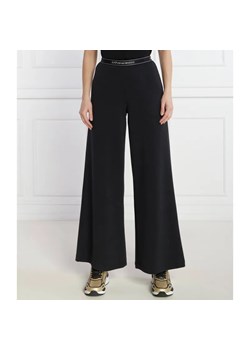 EA7 Spodnie | Loose fit ze sklepu Gomez Fashion Store w kategorii Spodnie damskie - zdjęcie 184513365