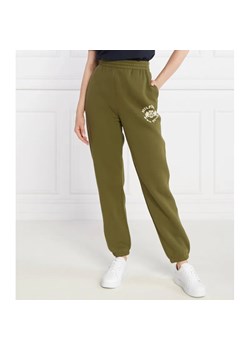 Tommy Hilfiger Spodnie dresowe VARSITY FLOCK | Relaxed fit ze sklepu Gomez Fashion Store w kategorii Spodnie damskie - zdjęcie 184515257