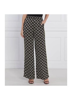 Karl Lagerfeld Spodnie PRINTED MONOGRAM | flare fit | high waist ze sklepu Gomez Fashion Store w kategorii Spodnie damskie - zdjęcie 184515877