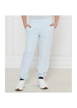 Tommy Hilfiger Spodnie dresowe | Regular Fit ze sklepu Gomez Fashion Store w kategorii Spodnie chłopięce - zdjęcie 184516087
