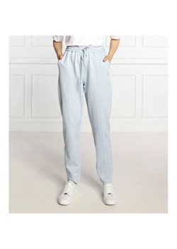 Tommy Hilfiger Spodnie dresowe | Regular Fit ze sklepu Gomez Fashion Store w kategorii Spodnie damskie - zdjęcie 184520617