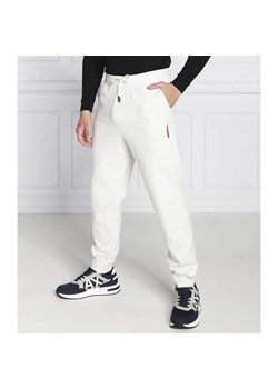 GUESS Spodnie dresowe Adam | Regular Fit ze sklepu Gomez Fashion Store w kategorii Spodnie męskie - zdjęcie 184521928