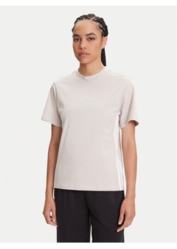adidas T-Shirt Essentials 3-Stripes JE1237 Beżowy Regular Fit ze sklepu MODIVO w kategorii Bluzki damskie - zdjęcie 184553506