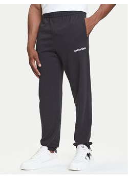 Calvin Klein Jeans Spodnie dresowe LV04RC294G Czarny Regular Fit ze sklepu MODIVO w kategorii Spodnie męskie - zdjęcie 184562256