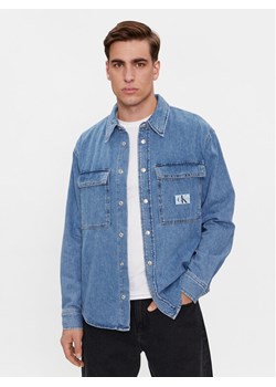 Calvin Klein Jeans Koszula jeansowa Relaxed Linear Denim Shirt J30J324582 Granatowy Regular Fit ze sklepu MODIVO w kategorii Koszule męskie - zdjęcie 184575275