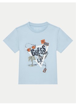 Guess T-Shirt N5GI05 K8HM4 Niebieski Regular Fit ze sklepu MODIVO w kategorii T-shirty chłopięce - zdjęcie 184578936