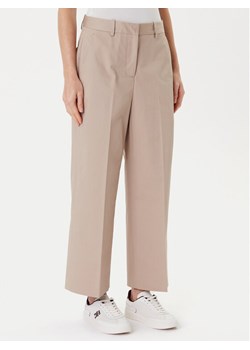 Tommy Hilfiger Spodnie materiałowe WW0WW45791 Beżowy Wide Leg ze sklepu MODIVO w kategorii Spodnie damskie - zdjęcie 184613266
