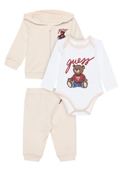 Guess Komplet dziecięcy H5YW12 KA6W4 Beżowy Regular Fit ze sklepu MODIVO w kategorii Odzież dla niemowląt - zdjęcie 184615087