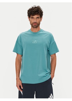 adidas T-Shirt ALL SZN JX5085 Turkusowy Loose Fit ze sklepu MODIVO w kategorii T-shirty męskie - zdjęcie 184623246