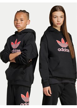 adidas Bluza Trefoil JV8650 Czarny Loose Fit ze sklepu MODIVO w kategorii Bluzy dziewczęce - zdjęcie 184623295