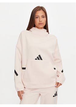 adidas Bluza Z.N.E. JF4782 Różowy Loose Fit ze sklepu MODIVO w kategorii Bluzy damskie - zdjęcie 184623319
