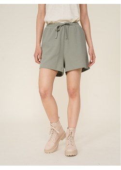 Outhorn Szorty sportowe OTHSS23TSHOF116 Zielony Relaxed Fit ze sklepu MODIVO w kategorii Szorty - zdjęcie 184623506