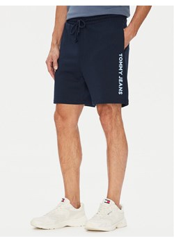 Tommy Jeans Szorty sportowe New Classic Beach DM0DM21781 Granatowy Relaxed Fit ze sklepu MODIVO w kategorii Spodenki męskie - zdjęcie 184632597