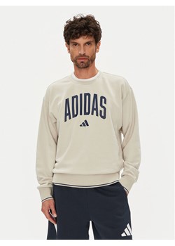 adidas Bluza Collegiate JM1732 Beżowy Regular Fit ze sklepu MODIVO w kategorii Bluzy męskie - zdjęcie 184632636