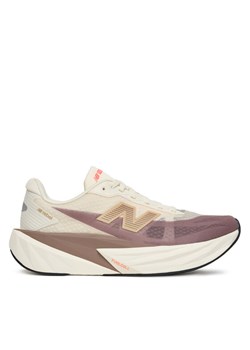 New Balance Buty do biegania FuelCell Rebel v5 WFCXLJ5 Beżowy ze sklepu MODIVO w kategorii Buty sportowe damskie - zdjęcie 184644575