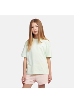 Koszulka dziecięca New Balance LAKG0001MEW – miętowa ze sklepu New Balance Poland w kategorii Bluzki dziewczęce - zdjęcie 184661855