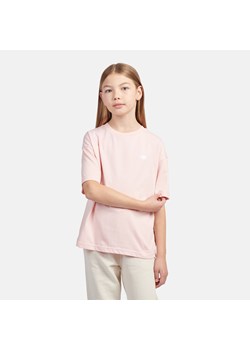 Koszulka dziecięca New Balance LAKG0001PIE – różowa ze sklepu New Balance Poland w kategorii Bluzki dziewczęce - zdjęcie 184661858