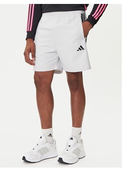 adidas Szorty sportowe Common Goal JW0239 Szary Regular Fit ze sklepu MODIVO w kategorii Spodenki męskie - zdjęcie 184672796