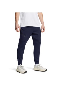 Męskie spodnie treningowe Under Armour UA Unstoppable Flc Jgr Eu - granatowe ze sklepu Sportstylestory.com w kategorii Spodnie męskie - zdjęcie 184680476