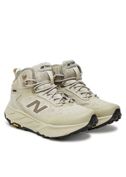 New Balance Buty do biegania Hierro MTHIMCA9 Beżowy ze sklepu MODIVO w kategorii Buty sportowe męskie - zdjęcie 184681898