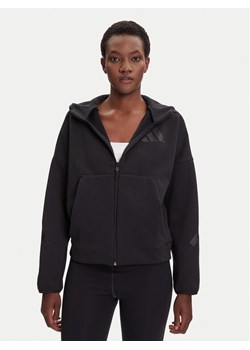 adidas Bluza Z.N.E. JE7848 Czarny Loose Fit ze sklepu MODIVO w kategorii Bluzy damskie - zdjęcie 184686847
