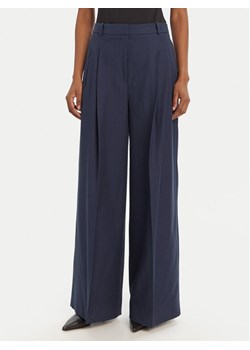 HUGO Spodnie materiałowe Harenau 50542606 Granatowy Relaxed Fit ze sklepu MODIVO w kategorii Spodnie damskie - zdjęcie 184701859