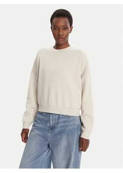 adidas Bluza Essentials Small Logo Feelcozy JI6069 Beżowy Loose Fit ze sklepu MODIVO w kategorii Bluzy damskie - zdjęcie 184706726