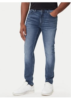 HUGO Jeansy Zane 50541551 Granatowy Extra Slim Fit ze sklepu MODIVO w kategorii Jeansy męskie - zdjęcie 184706727
