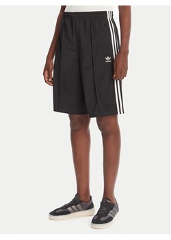 adidas Szorty sportowe adicolor Firebird JD0286 Czarny Loose Fit ze sklepu MODIVO w kategorii Szorty - zdjęcie 184706788