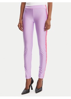 Versace Jeans Couture Legginsy 79HAC114 N0008 Fioletowy Slim Fit ze sklepu MODIVO w kategorii Spodnie damskie - zdjęcie 184730338