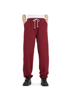 Spodnie damskie New Balance WP41513MHB - bordowe ze sklepu streetstyle24.pl w kategorii Spodnie damskie - zdjęcie 184750087