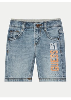 Guess Szorty jeansowe N5GD01 D41E0 Niebieski Regular Fit ze sklepu MODIVO w kategorii Spodenki chłopięce - zdjęcie 184754999