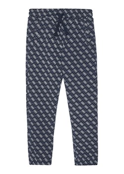 Guess Spodnie dresowe L5YQ15 KA6R4 Granatowy Regular Fit ze sklepu MODIVO w kategorii Spodnie dziewczęce - zdjęcie 184790309