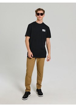 Sinsay - Koszulka z nadrukiem na plecach NASA - czarny ze sklepu Sinsay w kategorii T-shirty męskie - zdjęcie 184810027