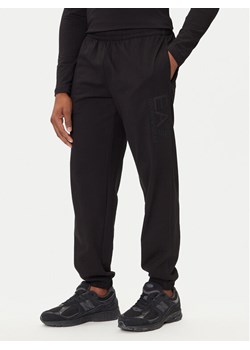 EA7 Emporio Armani Spodnie dresowe 7M000906 AF13512 UC001 Czarny Modern Fit ze sklepu MODIVO w kategorii Spodnie męskie - zdjęcie 184810908
