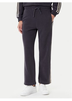 EA7 Emporio Armani Spodnie dresowe 7W000568 AF15528 U8117 Szary Relaxed Fit ze sklepu MODIVO w kategorii Spodnie damskie - zdjęcie 184842097