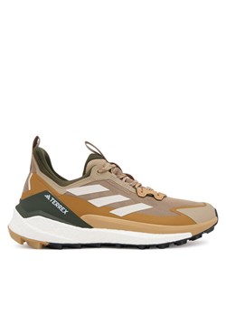 Trekkingi adidas Terrex Free Hiker 2.0 Low JQ9904 Brązowy ze sklepu eobuwie.pl w kategorii Buty trekkingowe męskie - zdjęcie 184863755