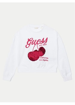 Guess Bluza J5GQ00 KA6R4 Biały Regular Fit ze sklepu MODIVO w kategorii Bluzy dziewczęce - zdjęcie 184888908