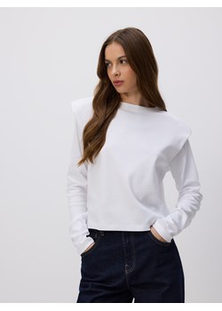 Reserved - Longsleeve z poduszkami na ramionach - złamana biel ze sklepu Reserved w kategorii Bluzki damskie - zdjęcie 184889126