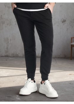 Sinsay - Spodnie dresowe slim jogger - czarny ze sklepu Sinsay w kategorii Spodnie męskie - zdjęcie 184934225