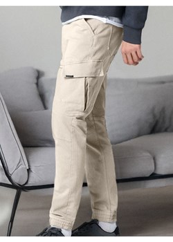 Sinsay - Jeansy regular jogger fit - beżowy ze sklepu Sinsay w kategorii Jeansy męskie - zdjęcie 184941008