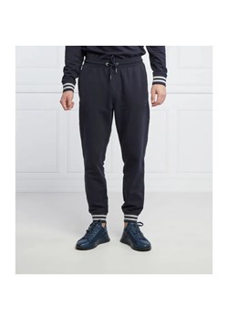 GUESS Spodnie dresowe Adam | Relaxed fit ze sklepu Gomez Fashion Store w kategorii Spodnie męskie - zdjęcie 184948196