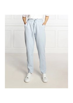 Tommy Hilfiger Spodnie dresowe | Regular Fit ze sklepu Gomez Fashion Store w kategorii Spodnie damskie - zdjęcie 184948469