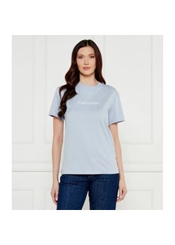 Calvin Klein T-shirt HERO LOGO | Regular Fit ze sklepu Gomez Fashion Store w kategorii Bluzki damskie - zdjęcie 184982499