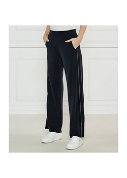 EA7 Spodnie dresowe | flare fit ze sklepu Gomez Fashion Store w kategorii Spodnie damskie - zdjęcie 185001767