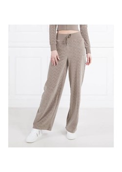 Juicy Couture Spodnie dresowe BEXLEY | flare fit ze sklepu Gomez Fashion Store w kategorii Spodnie damskie - zdjęcie 185002366